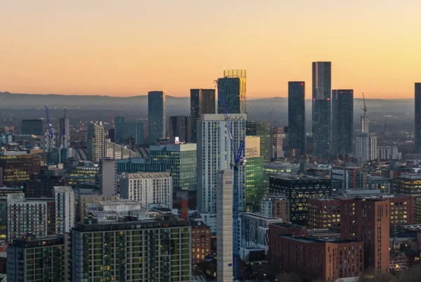 Manchester city centre skyline at dusk, the Deansgate Square towers on the right