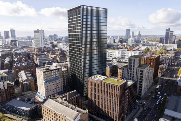 One Port Street, a dark-clad office building in Manchester city centre, seen from the air